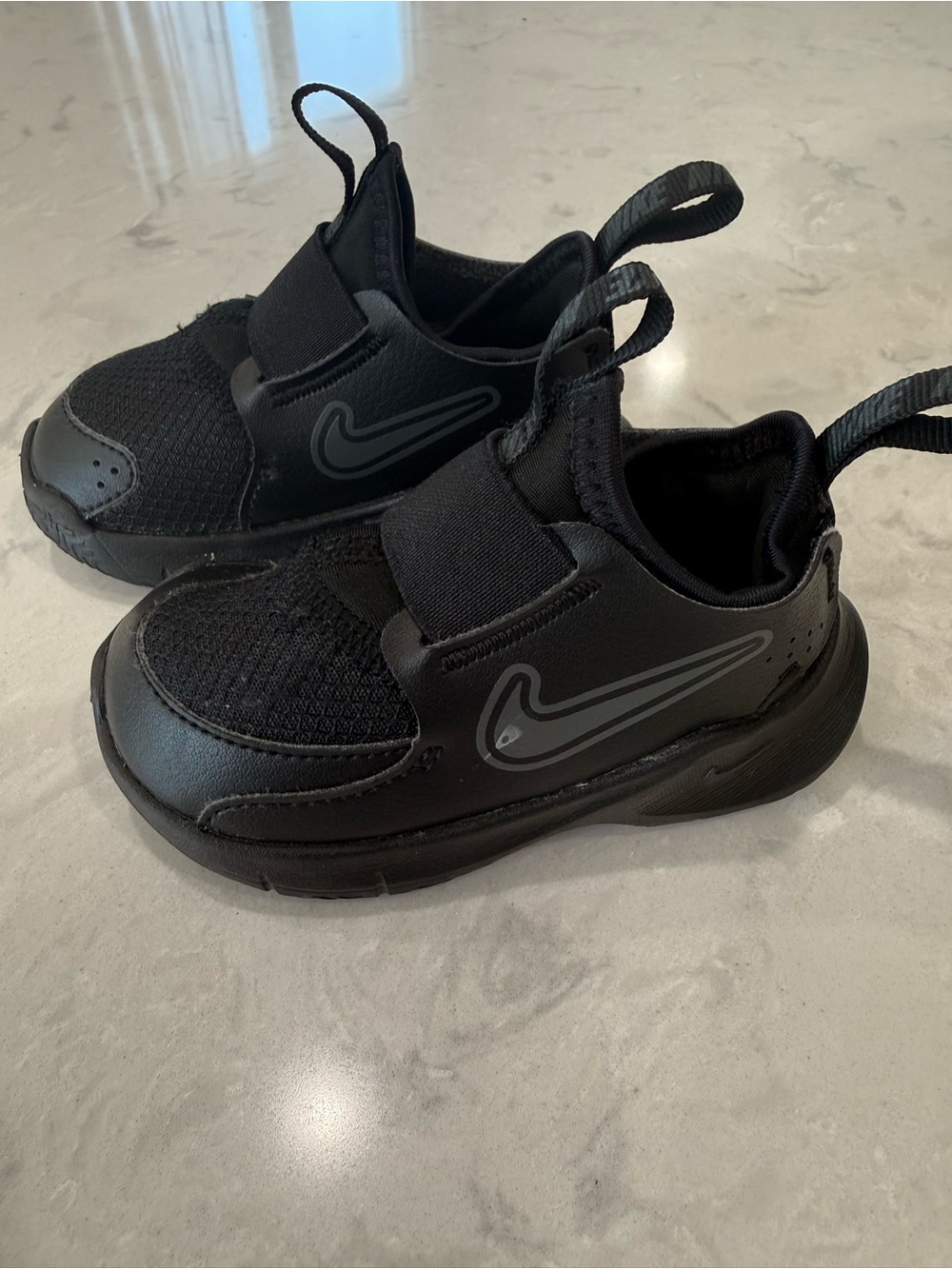 Nike Kids Black Slip-On Sneakers with Gray Swoosh